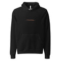 Black hoodie with orange text reading ✳ Frolicking...