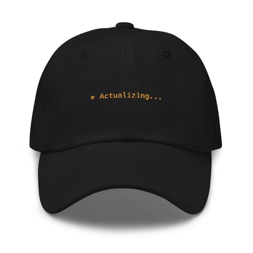 Claude Code Spinner Dad Hat - Actualizing - Black dad hat with orange embroidered text