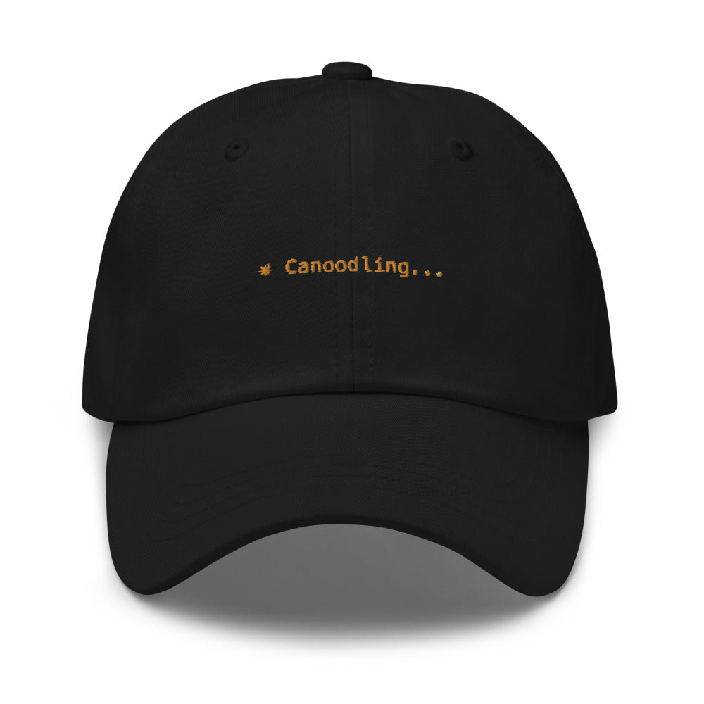 Claude Code Spinner Dad Hat - Canoodling - Black dad hat with orange embroidered text