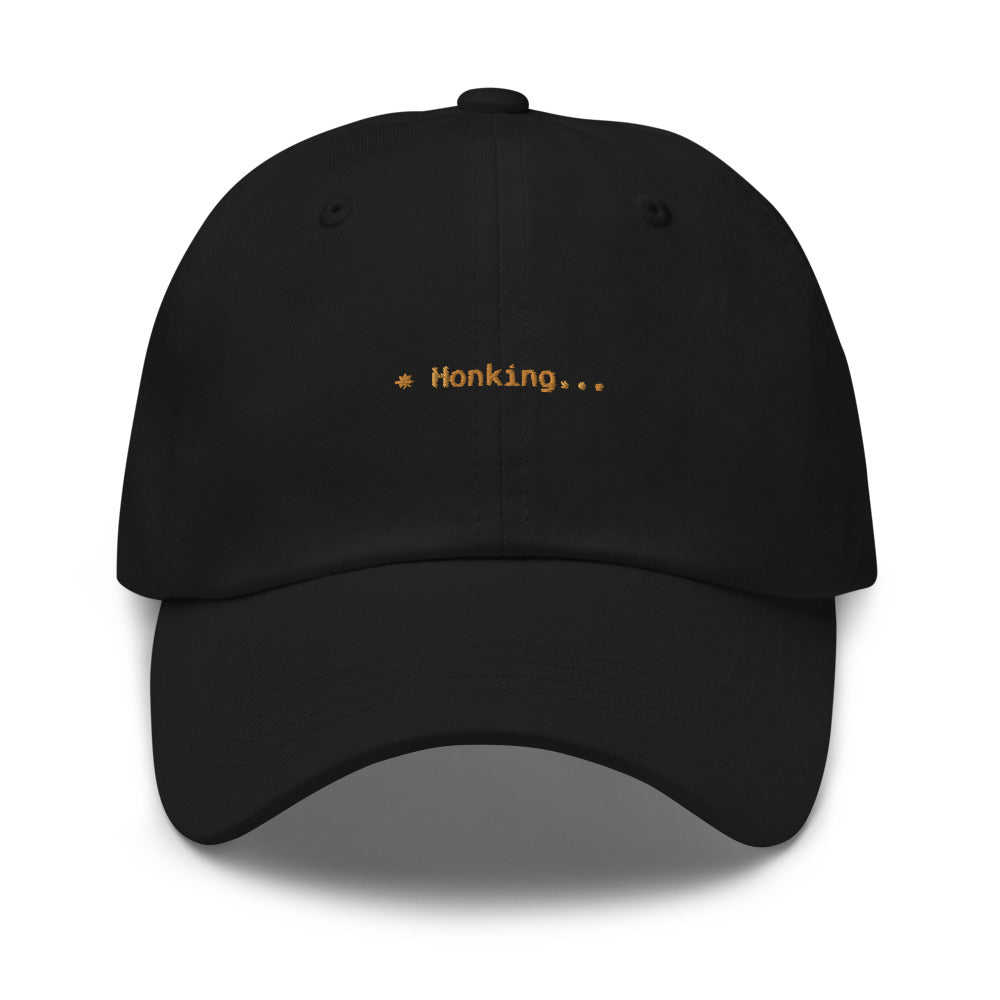 Claude Code Spinner Dad Hat - Honking - Black dad hat with orange embroidered text