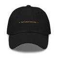 Claude Code Spinner Dad Hat - Hullaballooing - Black dad hat with orange embroidered text