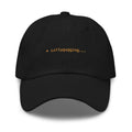 Claude Code Spinner Dad Hat - Lollygagging - Black dad hat with orange embroidered text
