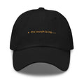 Claude Code Spinner Dad Hat - Philosophising - Black dad hat with orange embroidered text