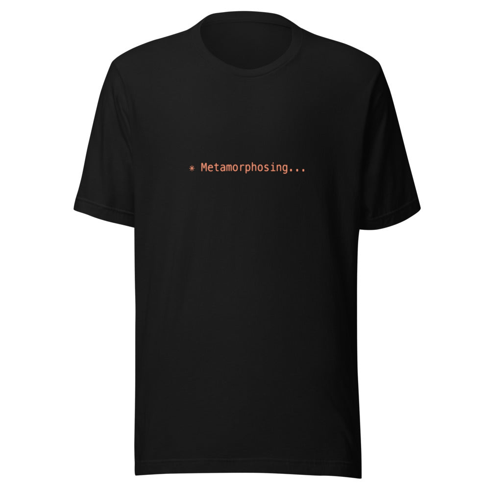 Black t-shirt with orange text reading ✳ Metamorphosing...