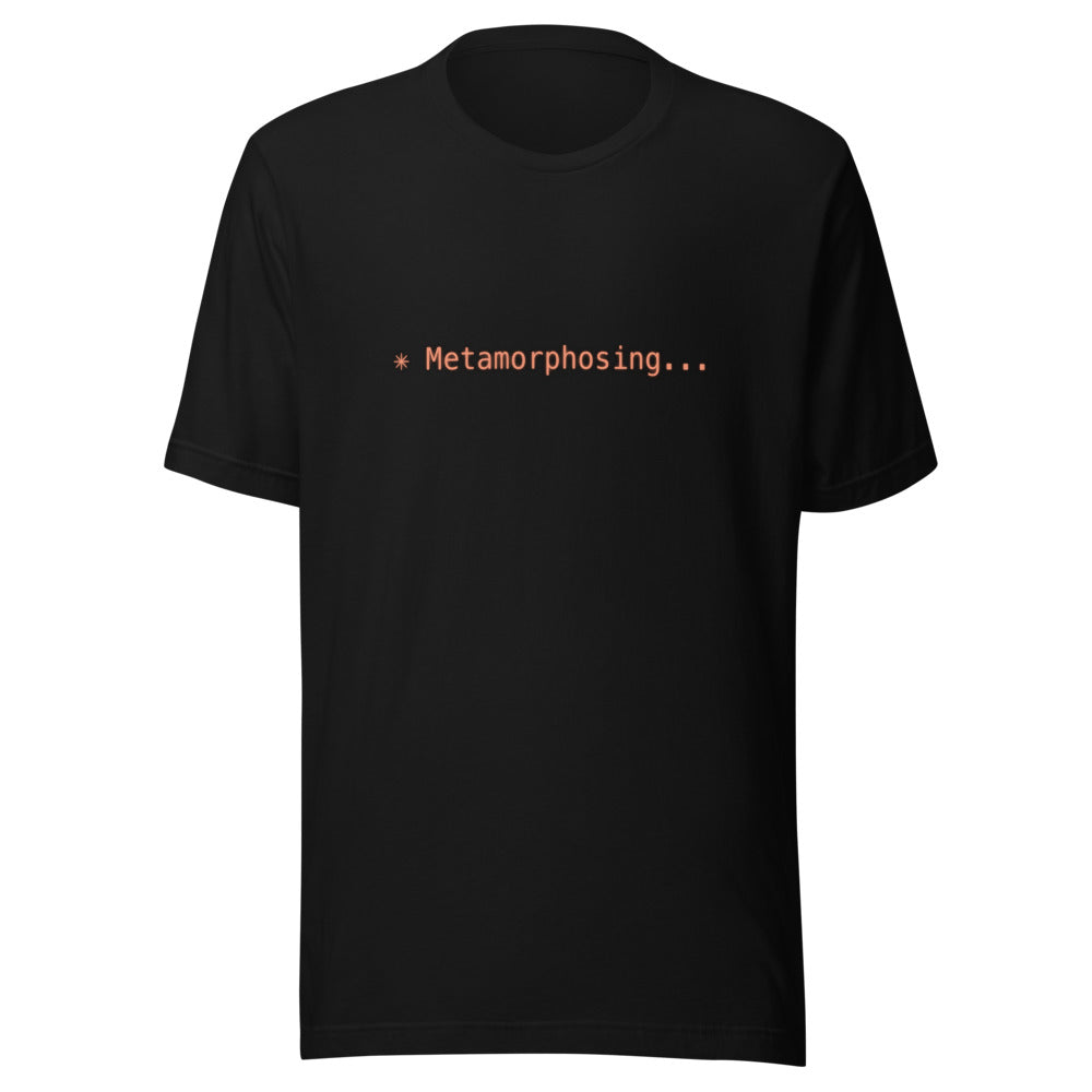 Black tee with orange text reading ✳ Metamorphosing...
