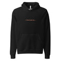 Black hoodie with orange text reading ✳ Shenaniganing...