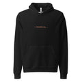 Black hoodie with orange text reading ✳ Skedaddling...