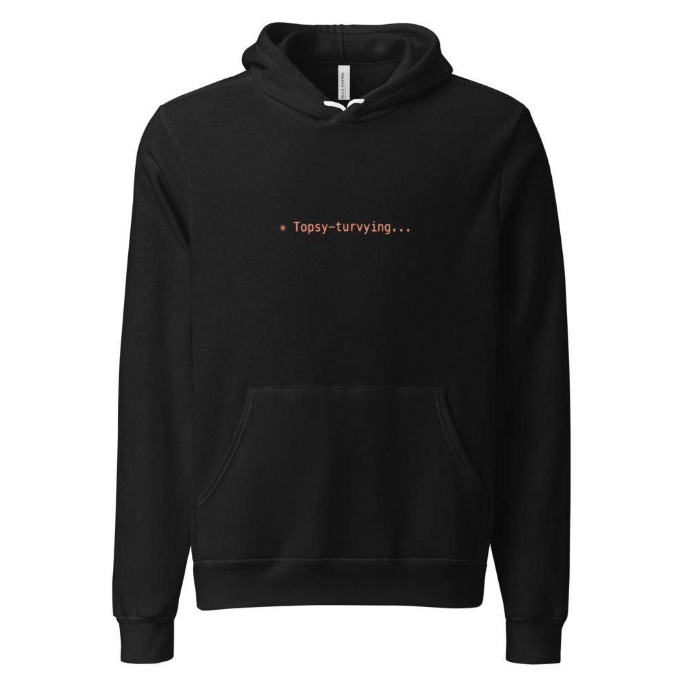 Black hoodie with orange text reading ✳ Topsy-turvying...